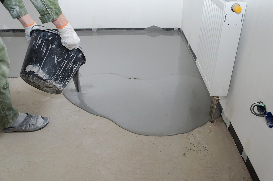 worker pouring the epoxy