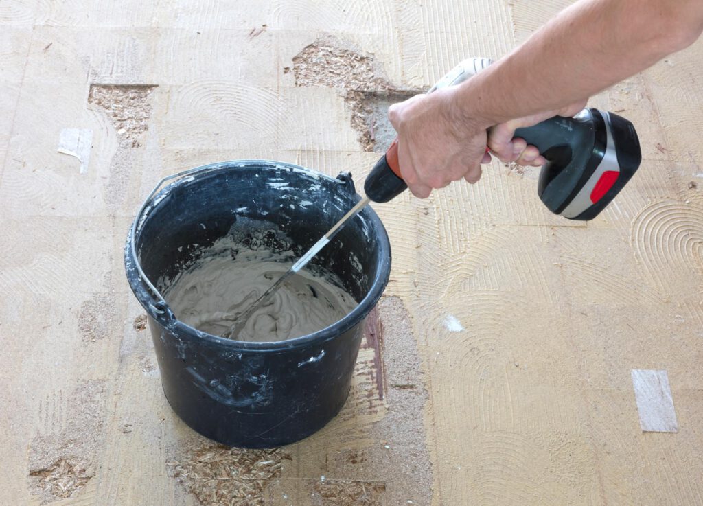 worker using a mixer